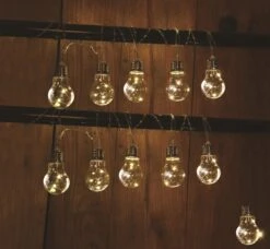 Solar Partylight 10x Transparant - L 3,8 M - 2 M Lead -Natuurcentrum Winkel 10x kunststof solar lamp aan snoer 3 8m 1500x1385 642eb5147b234 l